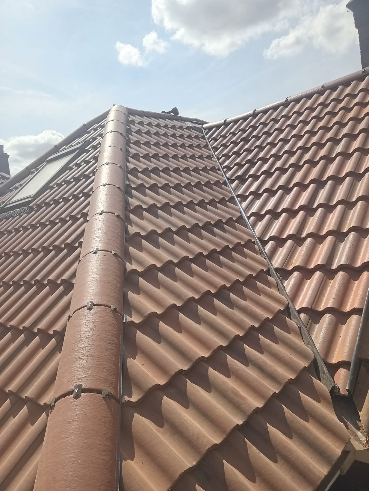 New Roof Installation by Natural Flow Roofing Systems